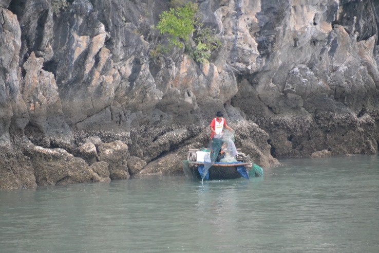 locals fishing on Halong Bay